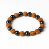 Beaded rudraksha and hematite bracelet with alternating black and brown beads