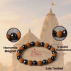 Rudraksha and hematite bracelet with inset closeups of black beads and brown rudraksha