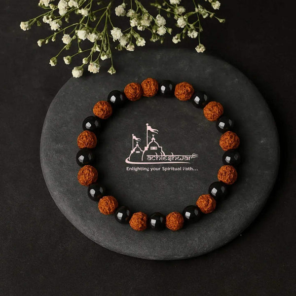 Rudraksha and hematite beaded bracelet arranged in a circle with black and brown beads