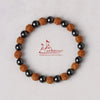 Beaded rudraksha and hematite bracelet with black round beads and brown textured beads
