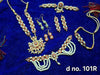 Ornament shringar set with beaded necklace, earrings, and headpiece, multicolor stones