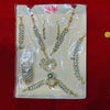 Goddess jewelry shringar set: gold-tone necklace, earrings, and bangles with green centerpiece