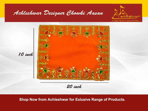 Orange velvet pooja aasan cloth showing gold and green embroidered edge detailing
