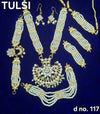 Pearl bead and gold-tone jewellery set with necklace, earrings, bangles and pendant