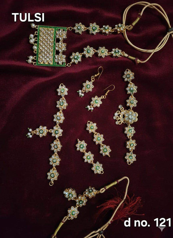 Gold-tone shringar jewellery set with teal stones: necklace, earrings, and headpiece