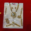 Green-and-gold beaded jewellery set, shown in packaging with necklace, earrings, pendants