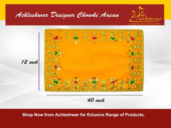 Yellow velvet embroidered pooja asaan cloth with colorful border motifs, rectangular