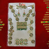 Festival goddess jewellery set in clear box with green enamel earrings, necklace, and pendant