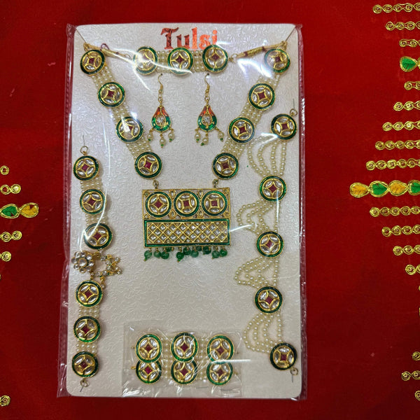 Festival goddess jewellery set in clear box with green enamel earrings, necklace, and pendant