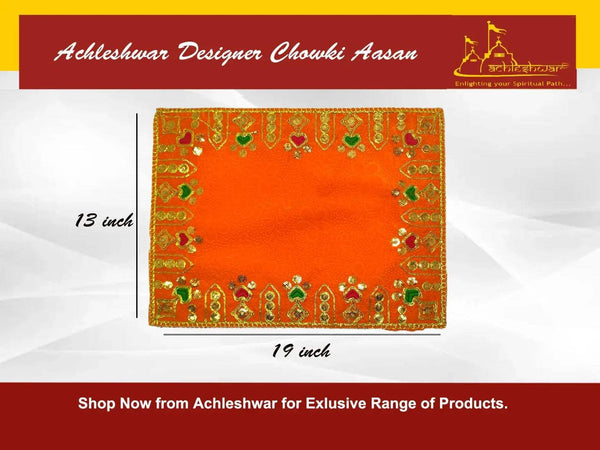 Orange velvet pooja aasan cloth with decorative gold trim and green motifs on border