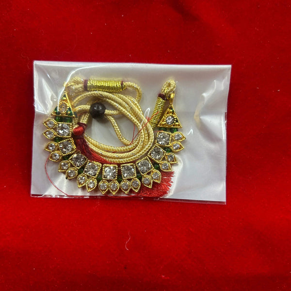 Decorative gold-toned idol shringar garland with rhinestone border and red accent