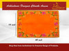 Orange pooja asan cloth with green, pink and gold embroidered border; 40x16 in
