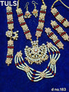 Gold-tone idol shringar jewellery set with red and pearl bead drops and matching earrings