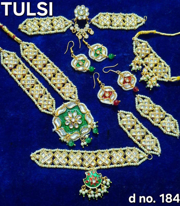 Goddess jewelry ornament set with gold-tone choker, armlet, and drop earrings with green stones