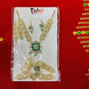 Goddess jewelry ornament set in retail package, gold-tone pieces with green and red stones