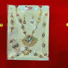 Jewelry shringar ornament set in plastic pouch with multicolor stones and gold-tone pieces