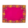 Pink pooja asan with ornate golden border and green-gold embroidered frame design.