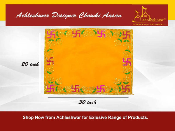 Yellow velvet chowki aasan seat with gold stitched frame and colorful decorative motifs