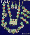 Traditional shringar necklace set with green square hangings, pearl strands and red beads