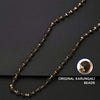 Bead mala necklace with dark beads and small silver flower spacers, long strand