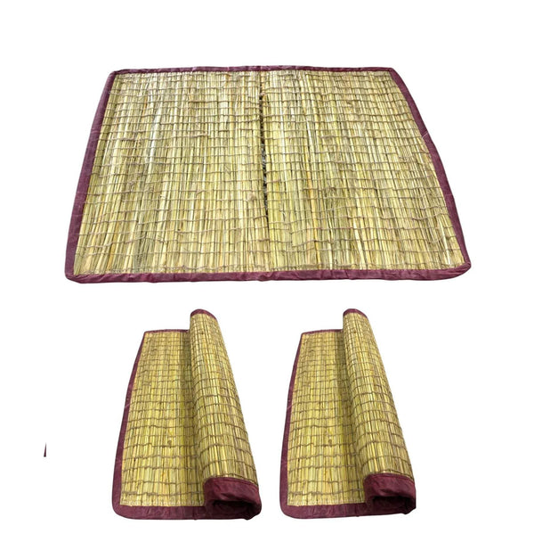 Woven kusa mat with purple border plus two rolled ends, showing underside