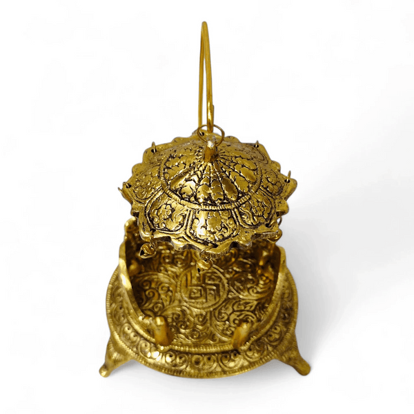 Antique gold singhasan top view with pointed finial and domed carved canopy