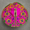 Embroidered round magenta poshak with gold center stripe and floral accents
