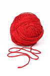 Red yarn ball with loose strands