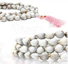 Triple-strand bead mala necklace with white-grey beads and pink tassel