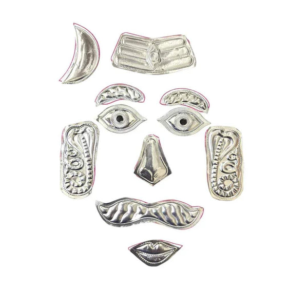 Silver-tone Shivling face ornament pieces: crescent, eyes, nose, moustache, arms, lips