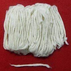 White cotton wick bundle with loose wick strand