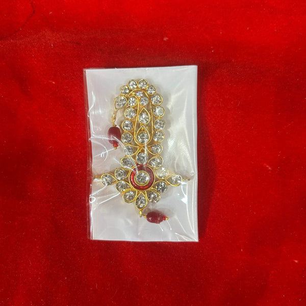 Gold rhinestone idol kilangi ornament with red bead drops on clear backing
