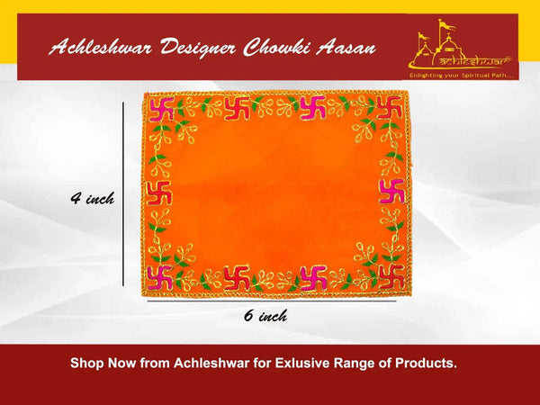 Orange velvet pooja aasan cloth with ornate gold and green embroidered border, square