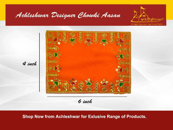 Orange velvet pooja cloth with gold and green embroidered border and motifs