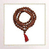 Rudraksha bead mala with dark brown beads, double loop, and red tassel