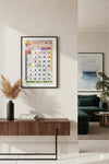 Framed 2026 Hindi calendar on wall with colorful date grid