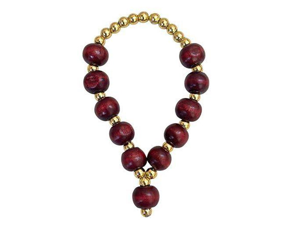 Red wooden bead mala with gold spacer beads and small hanging gold charm