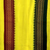 Close-up of yellow gamcha/patka with maroon stripe and dark geometric border