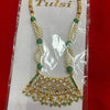 Gold-tone shringar necklace with green bead strings and jeweled pendant fringe