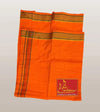 Orange cotton dhoti with brown-gold border stripes and small logo patch