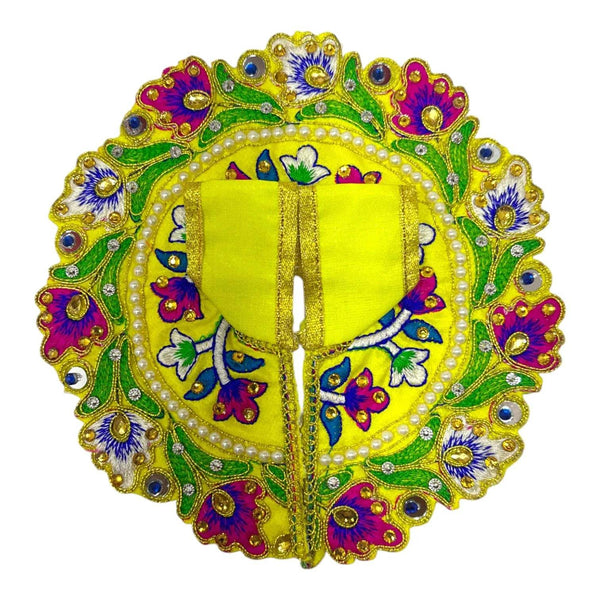 Handmade embroidered baby Krishna poshak with lime-green center panel and blue floral motifs
