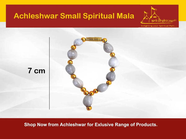 Gray-bead mala with gold-toned spacers and center charm, single loop; 7 cm