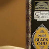 Sacred Scents Pure Black Oud incense box label in gold and tan