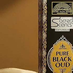 Sacred Scents Pure Black Oud incense box label in gold and tan