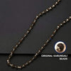 Beaded mala necklace with dark wood beads and small silver-toned bead chain