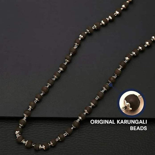 Beaded mala necklace with dark wood beads and small silver-toned bead chain