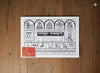 Panchang Jantri booklet cover on a wooden surface with zodiac panels and Devanagari