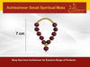 Small sandalwood mala with maroon beads and gold accents, about 7 cm