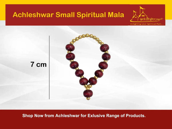 Small sandalwood mala with maroon beads and gold accents, about 7 cm