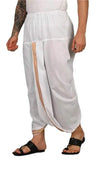 White cotton dhoti pants with elastic waistband and vertical zari border pocket